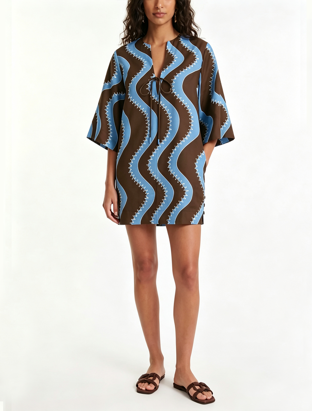 Women's wave print mini dress with collar, elbow sleeves, button front. Perfect casual summer or vacation style.