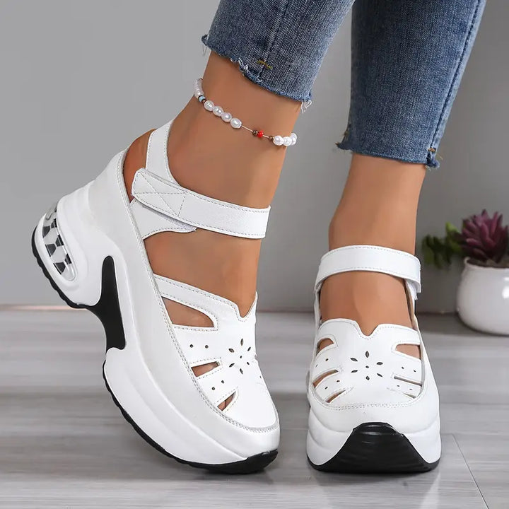 Breathable women's wedge platform sandals featuring stylish cutouts and a comfortable design for summer.