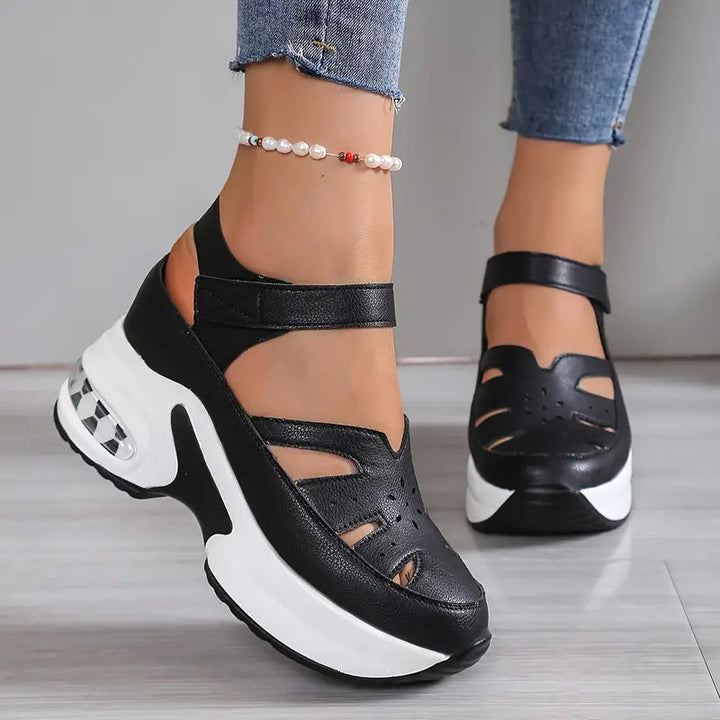 Women's vacation-ready wedge platform sandals with adjustable straps, cushioned and breathable cutout design.