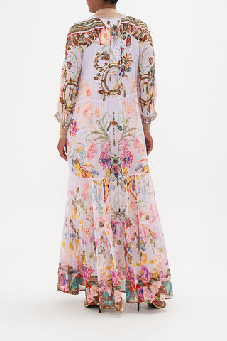 Bohemian Marisol maxi dress with delicate floral pattern. Ideal for casual summer days or elegant resort wear.
