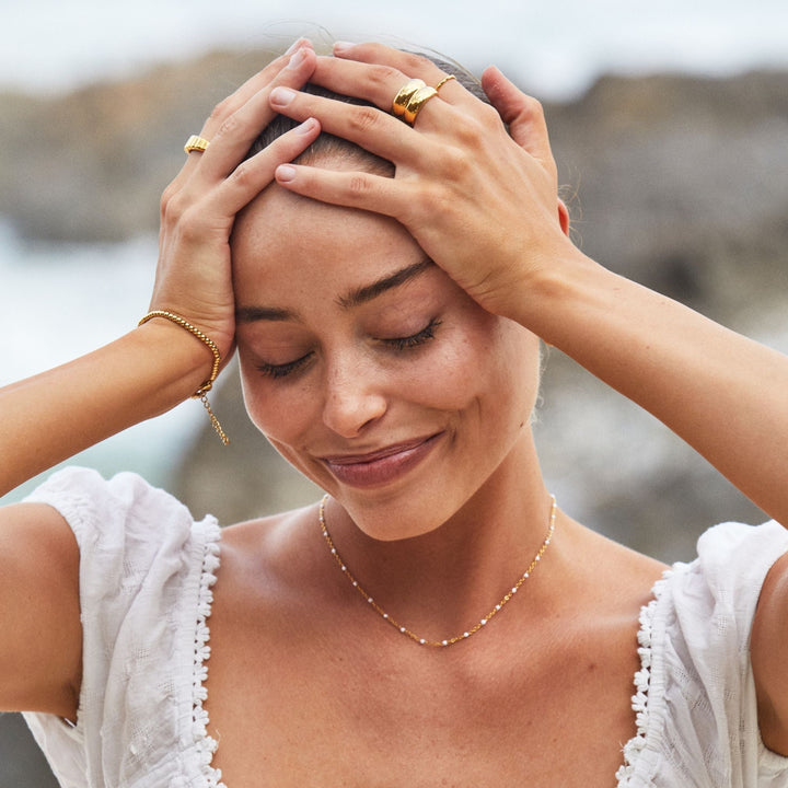 Women's white enamel bead choker. Minimalist jewelry, perfect for layering.