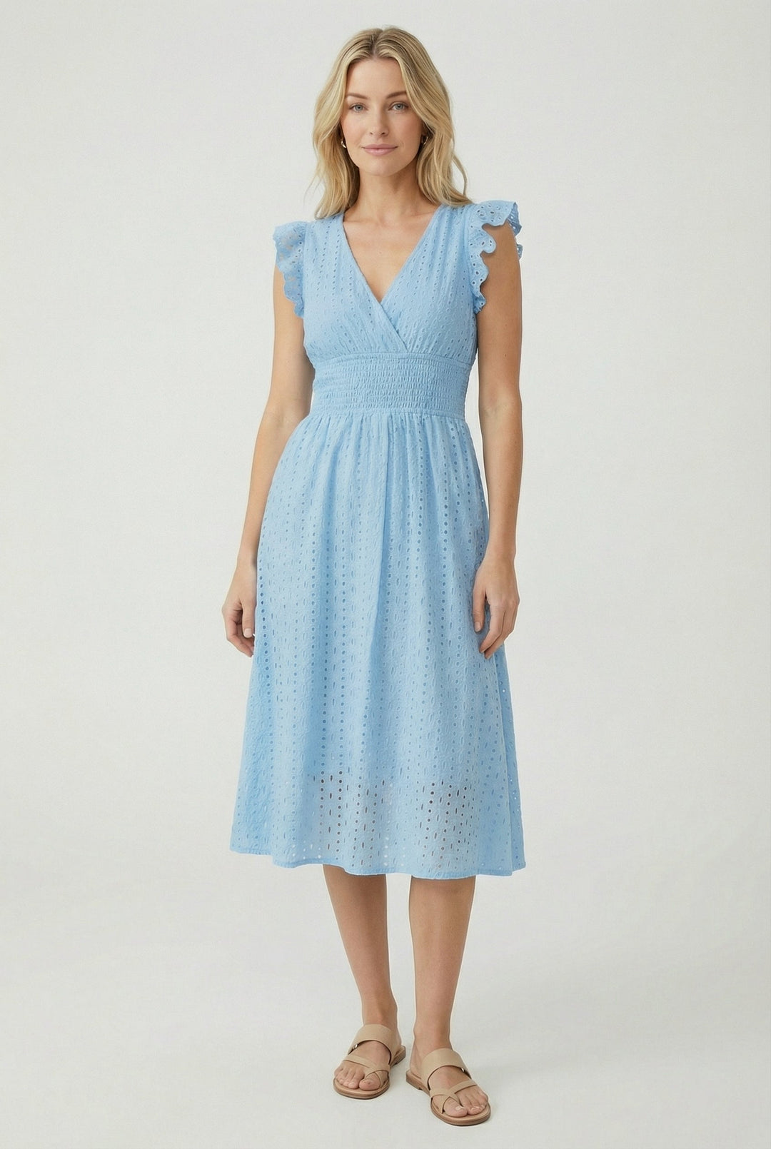 Versatile women's eyelet dress, midi length, with flared design & ruffled sleeves for summer.