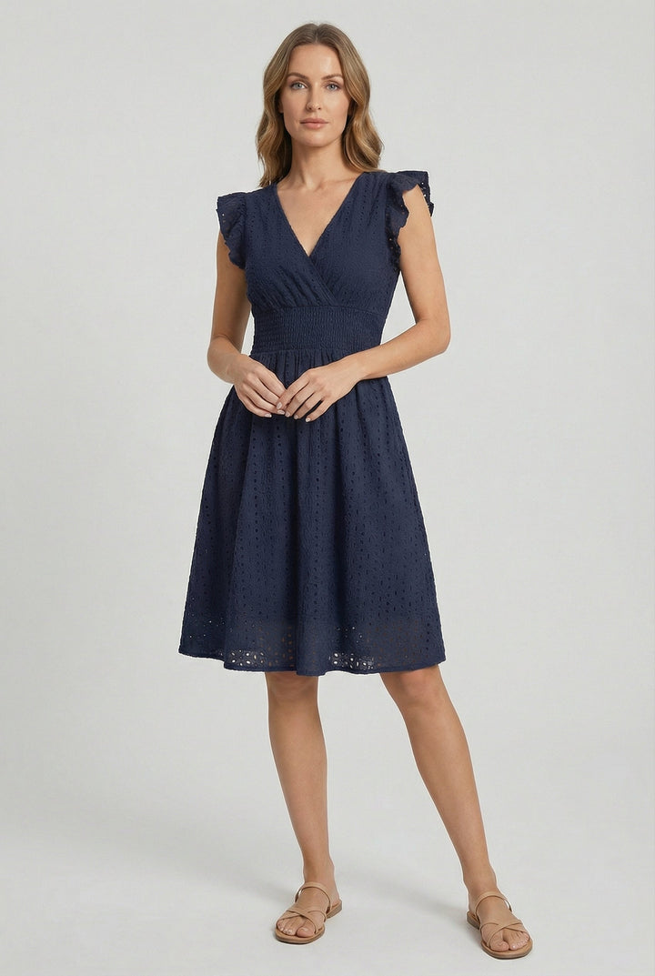 Women's white eyelet midi dress, perfect summer day dress with cute ruffled sleeves.