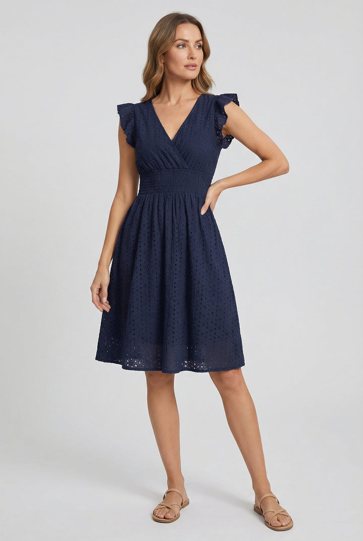 Lightweight eyelet midi dress for women, flared skirt, ruffled sleeves, ideal for day wear.