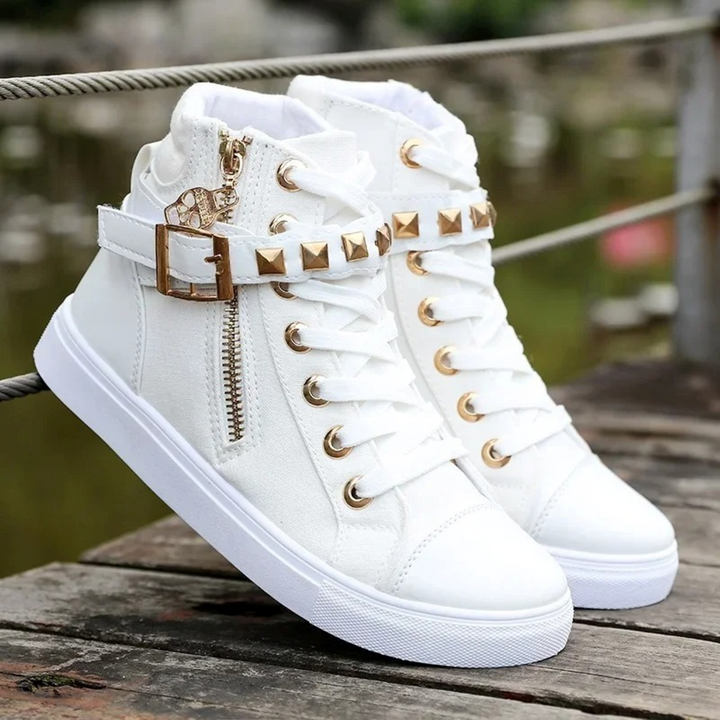 Women's white high-top sneakers with zipper closure, perfect for casual chic style & comfort.