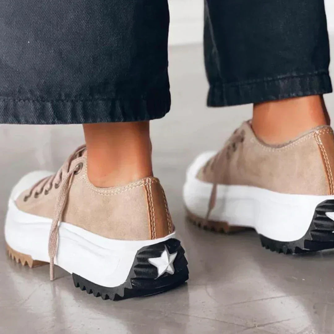 Trendy women's platform fashion sneakers, versatile for everyday wear, offering an elevated and stylish look.