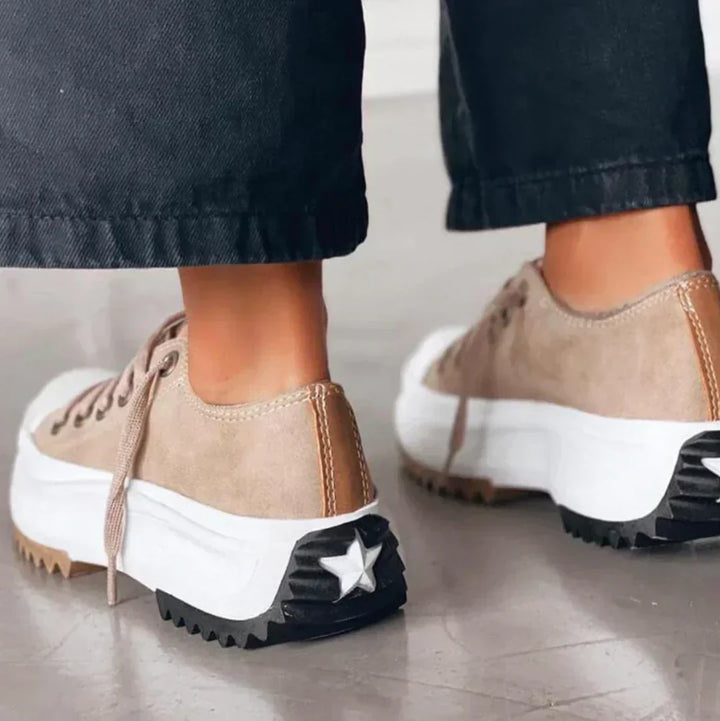 Trendy women's platform fashion sneakers, versatile for everyday wear, offering an elevated and stylish look.