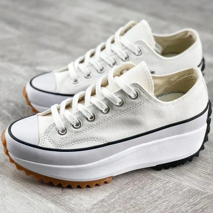 Elevate your look with these comfortable women's platform sneakers, perfect stylish lace-up footwear for daily wear.