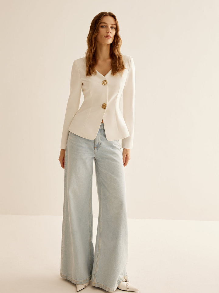 Elegant white slim fit women's blazer, ideal for business casual or formal office wear. A versatile tailored jacket.