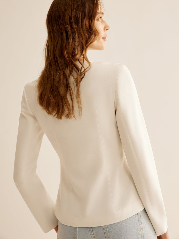 White slim fit blazer for women, a professional tailored jacket enhancing office fashion & business casual outfits.