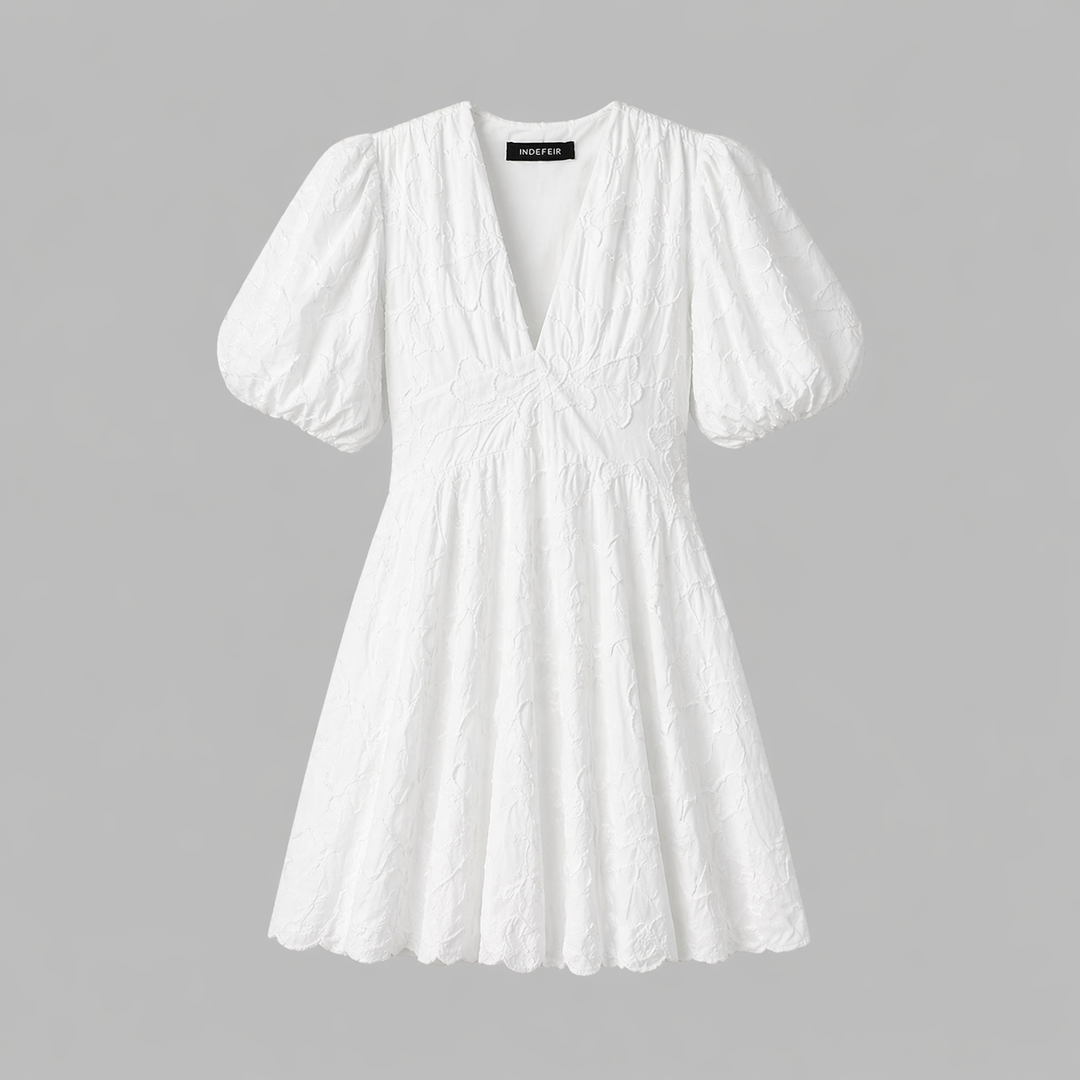 Stylish women's white floral midi dress, a versatile V-neck A-line for elegant daywear or a casual summer evening.