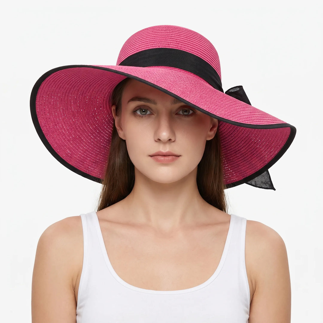 Chic women's wide brim floppy sun hat, perfect for beach, pool, travel. Provides stylish sun protection.