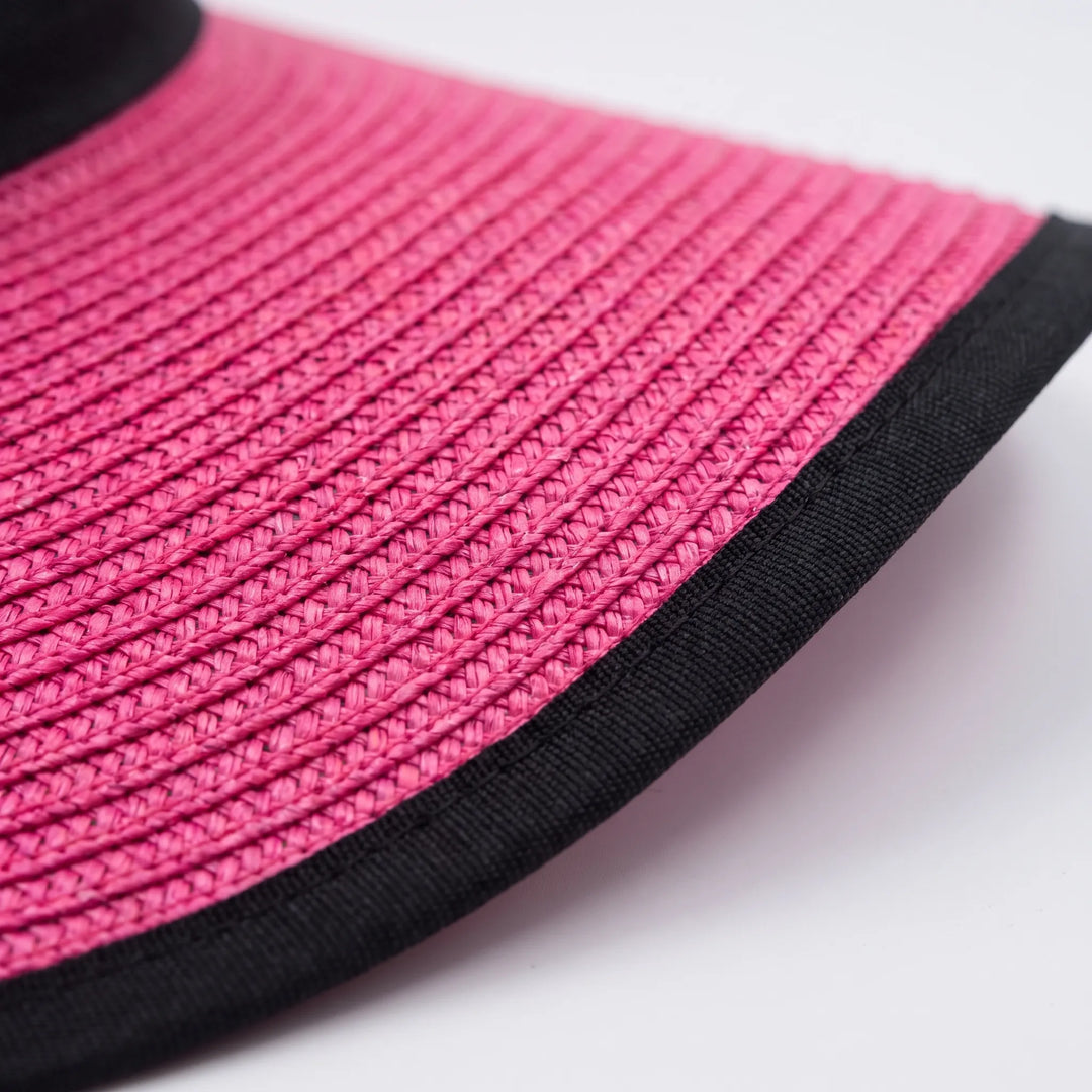 Packable wide brim floppy sun hat for women, ideal for summer vacation & beach trips. Essential travel accessory.
