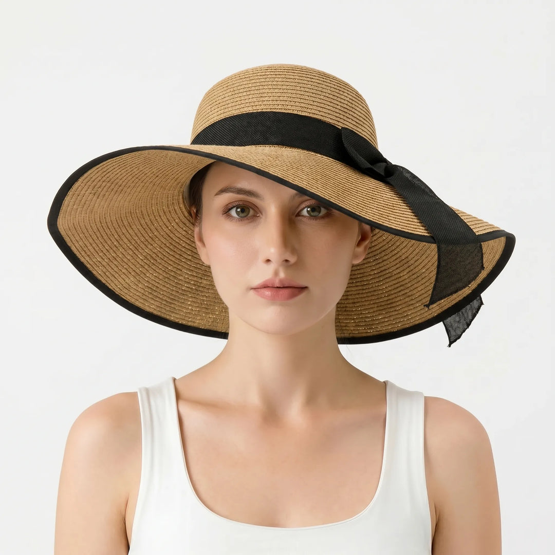 Women's summer wide brim floppy sun hat. Perfect for beach, travel & vacation. Packable & fashionable.