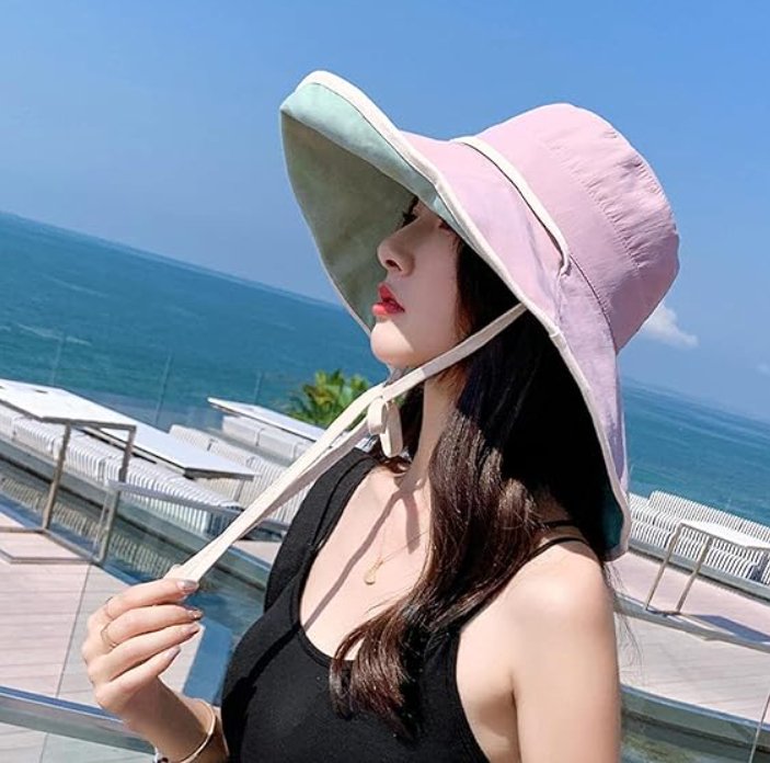 Elegant women's foldable sun hat, Livia, featuring a wide brim for maximum sun protection