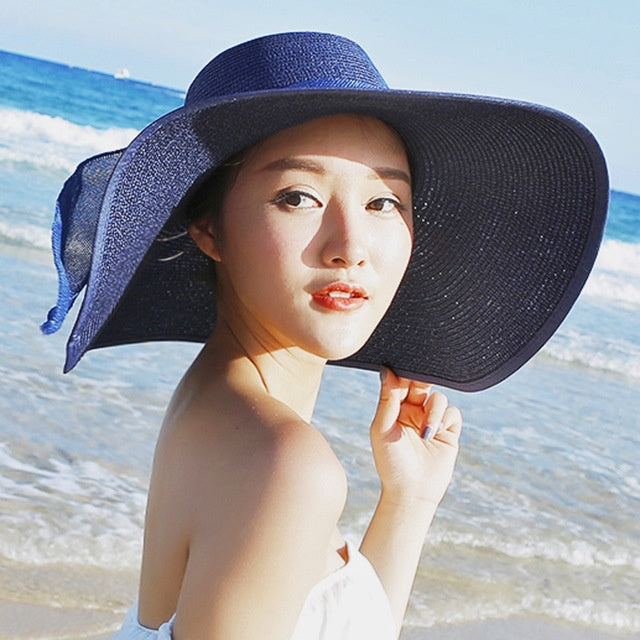 Damen-Strohhut with wide brim, sun protection, a stylish women's hat for beach days and outdoor events