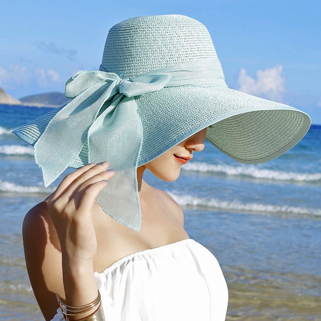 Candy wide brim straw sun hat, a chic women's accessory for ultimate sun protection during summer
