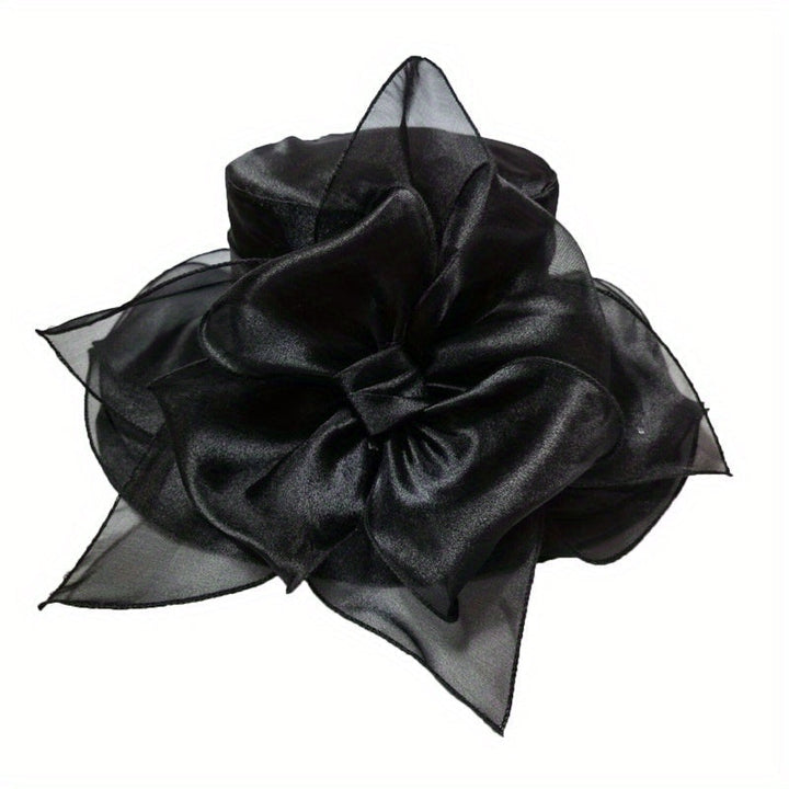 Polyester women's wide brim sun hat, offering breathable UV protection.