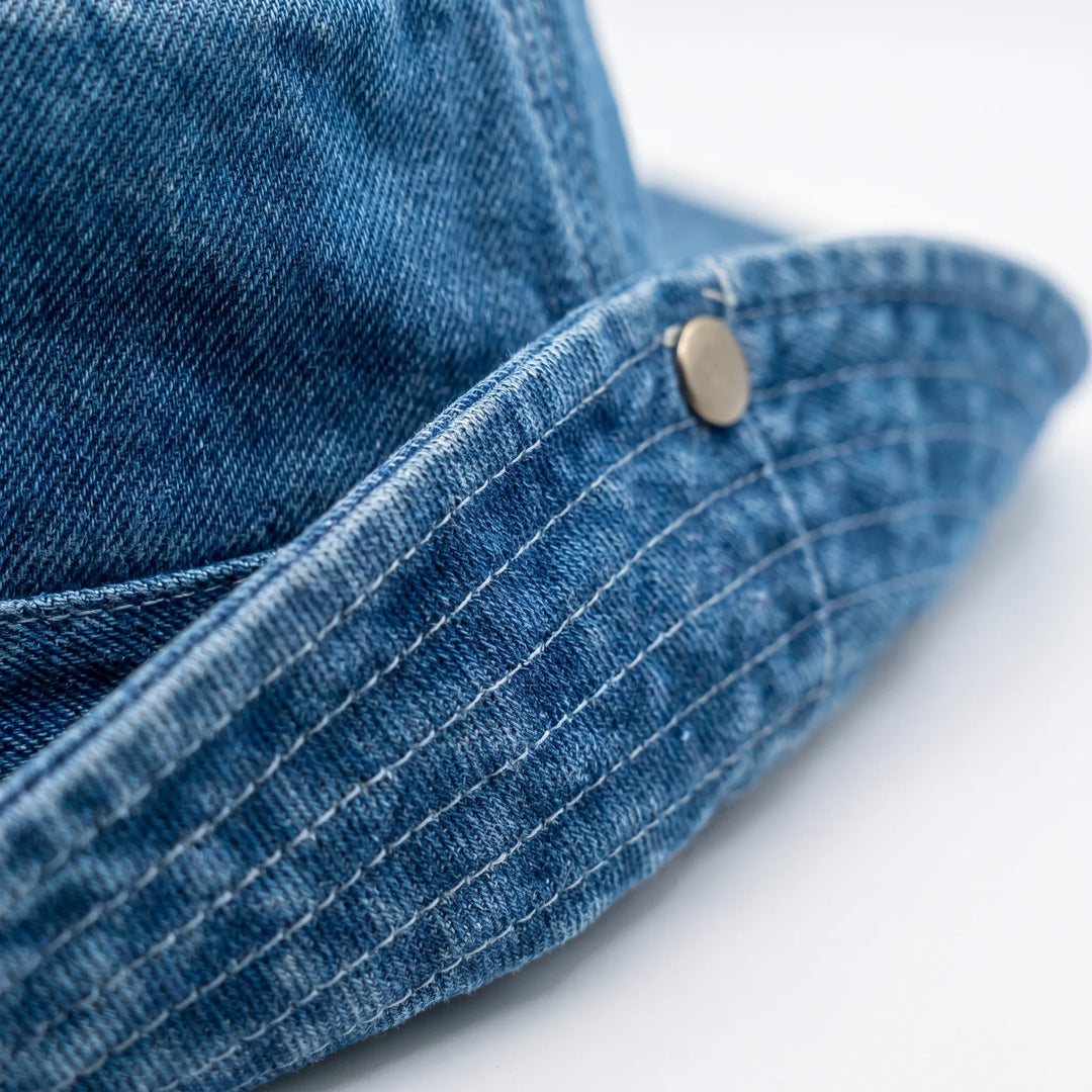 Versatile women's wide brim bucket sun hat. Trendy casual summer accessory offering great sun protection for beach, travel & daily wear.