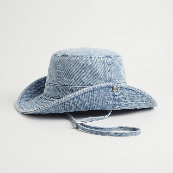 Adjustable & packable women's wide brim sun bucket hat. Comfortable summer accessory for beach, travel, and outdoor sunny adventures.