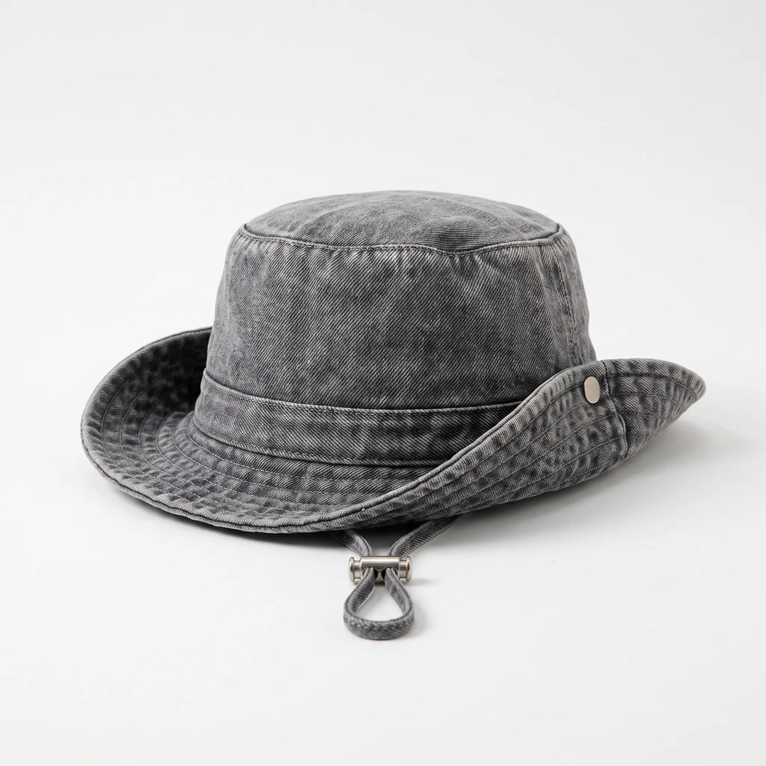 Chic women's wide brim bucket hat. A stylish and practical summer accessory for sun protection, perfect for beach, travel, and casual wear.