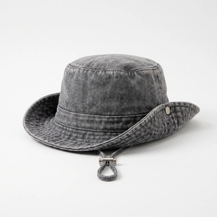 Chic women's wide brim bucket hat. A stylish and practical summer accessory for sun protection, perfect for beach, travel, and casual wear.