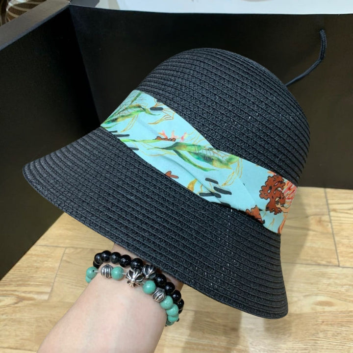 ShadeRibbon women's wide brim sun hat with bow, great for outdoor UV protection.