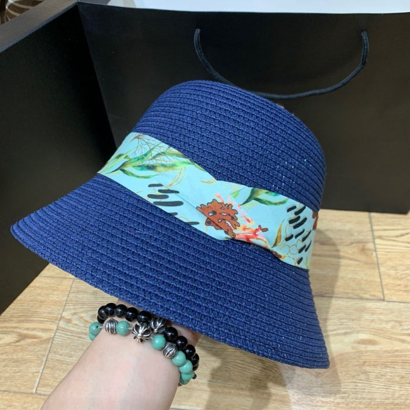 Women's summer fashion hat, wide brim & bow, perfect for sunny beach days.