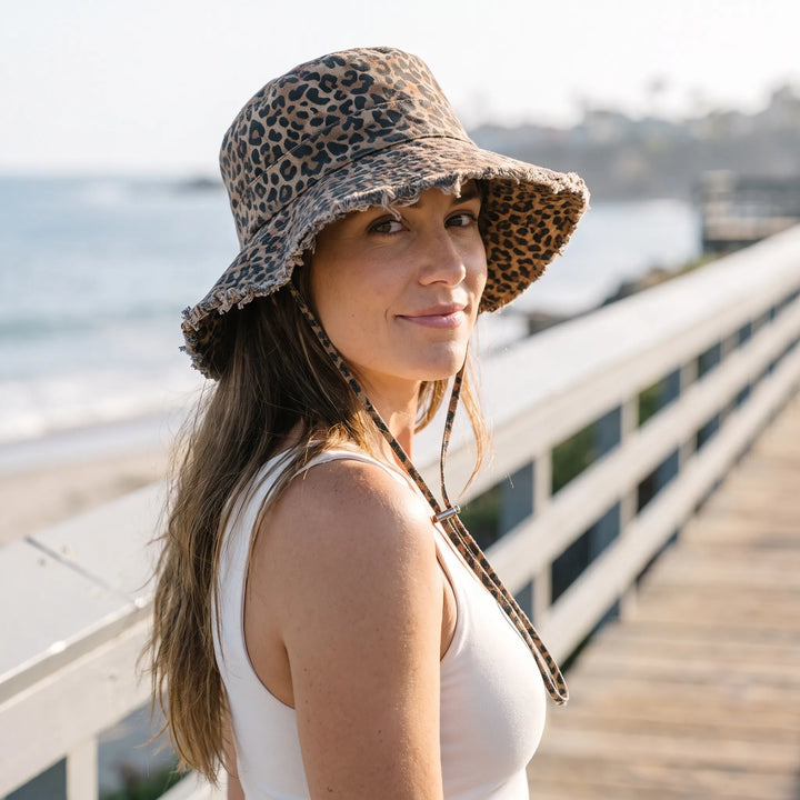 Women's wide brim sun protection bucket hat. Perfect for beach, travel, and summer outdoor activities.