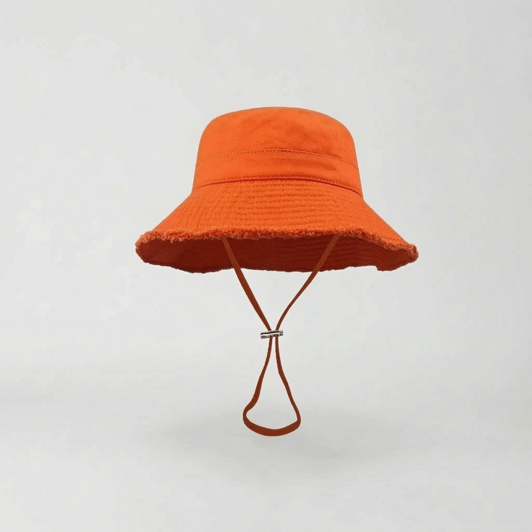 Comfortable women's wide brim sun hat. Adjustable bucket hat, perfect for travel, beach, and everyday outdoor style.