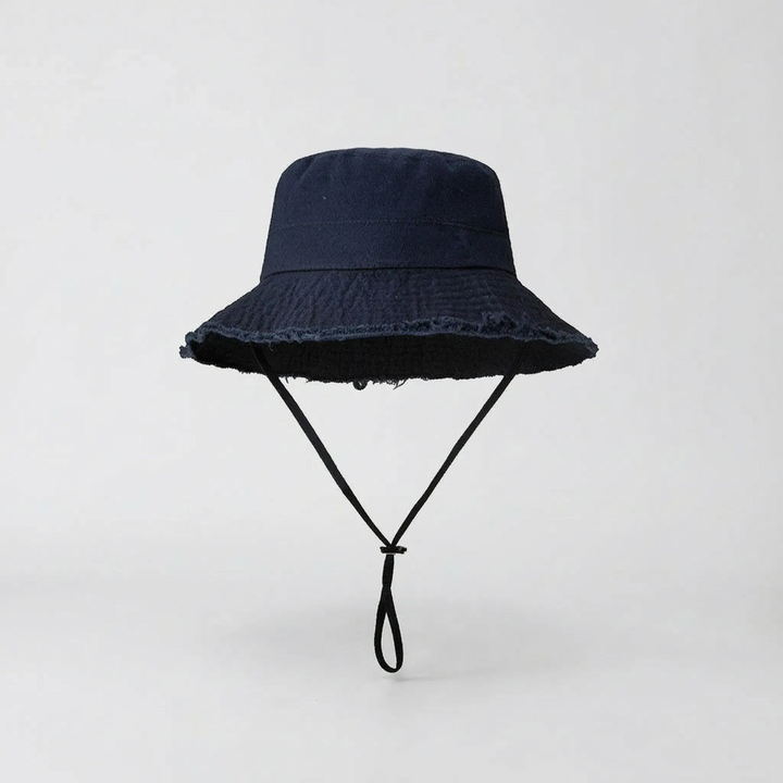 Classic women's solid wide brim bucket hat. A stylish summer accessory offering excellent sun protection.
