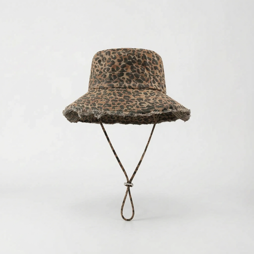 Leopard print women's wide brim sun hat. Trendy bucket hat for stylish sun protection on vacation.