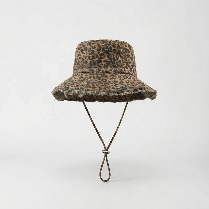 Leopard print women's wide brim sun hat. Trendy bucket hat for stylish sun protection on vacation.