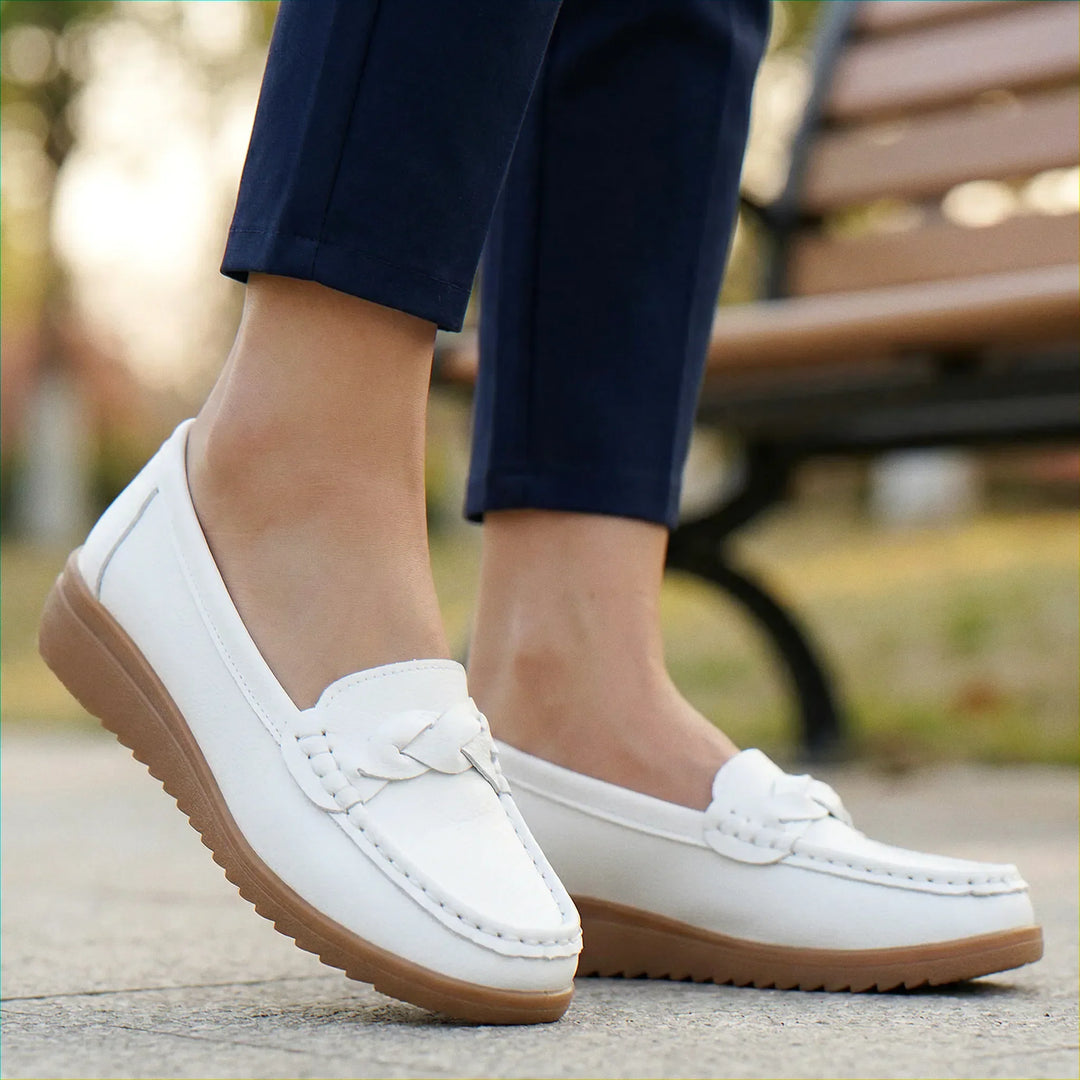 Foot-friendly wide fit women's loafers with orthopedic arch support for comfort.