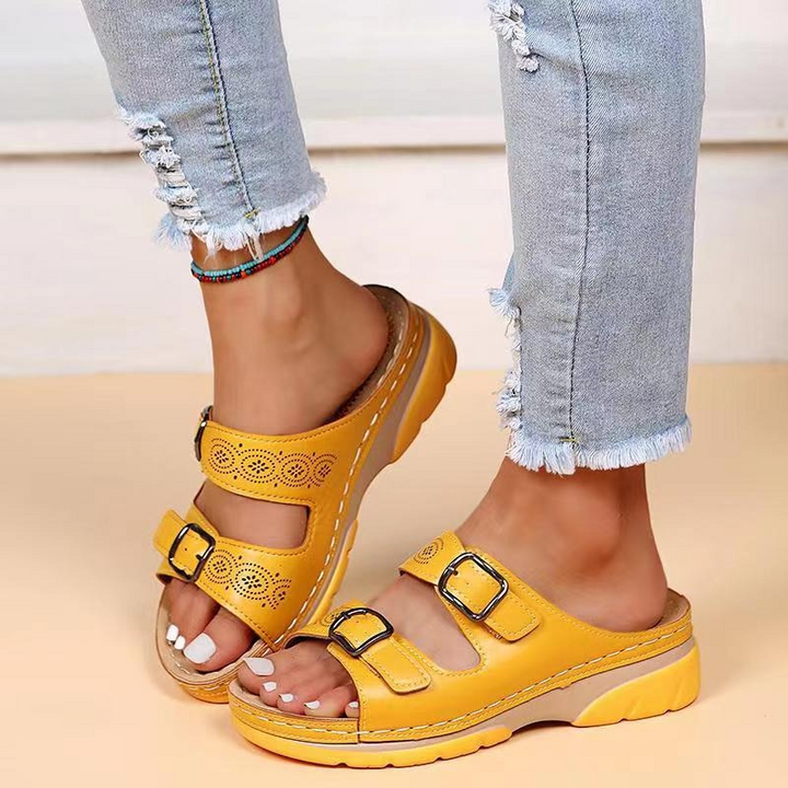 Pain-relief orthopedic sandals for women, wide fit, with cushioned arch support & ultimate comfort.