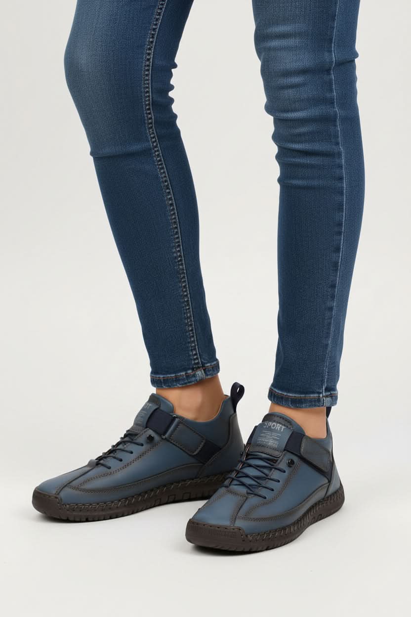 Lace-up women's walking shoes, designed for all-day comfort. Wide fit, cushioned support, and breathable material.