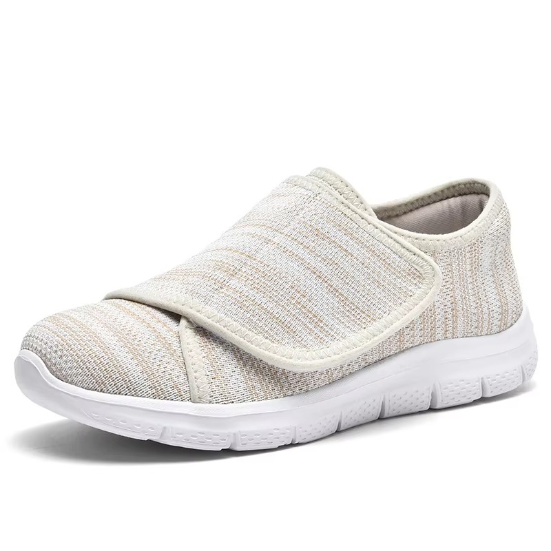 Breathable women's wide fit walking shoes, cushioned for comfort & foot support.