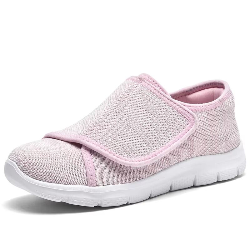 Casual women's wide fit sneakers, adjustable for easy wear & superior cushioning.