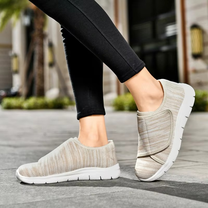 Breathable women's wide fit casual sneakers, adjustable for a perfect, cushioned fit.