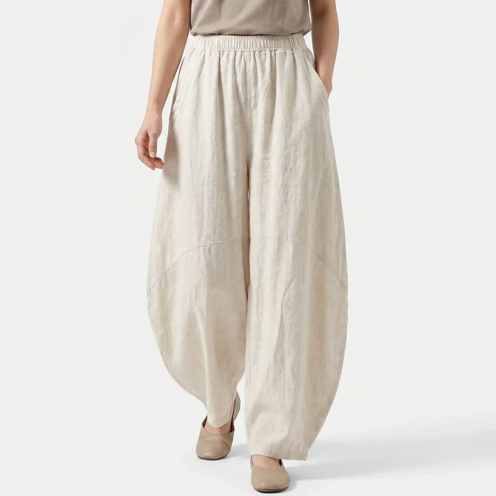 Stylish women's wide-leg trousers, loose fit & flowy for effortless comfort. Ideal for everyday casual fashion.