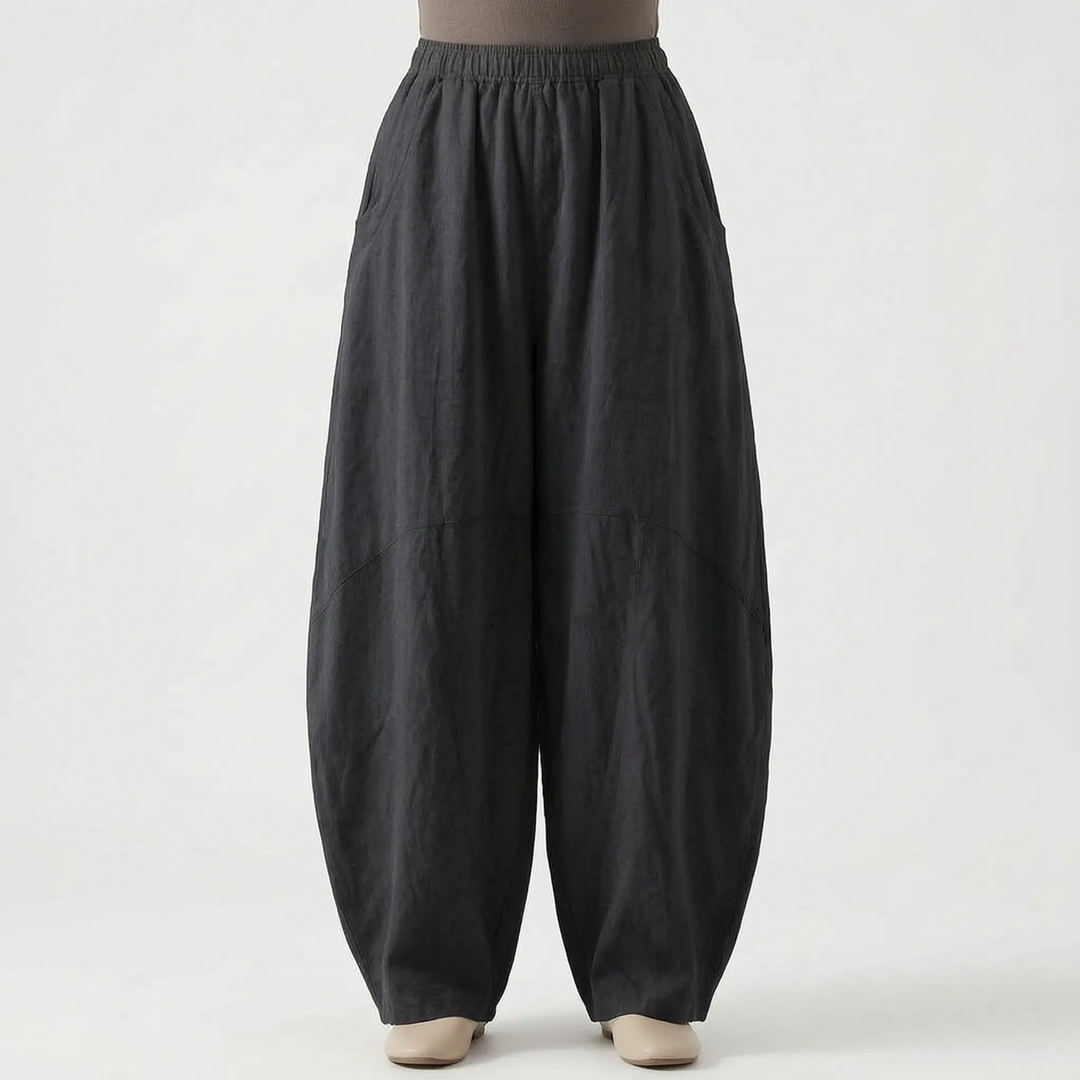 Relaxed fit women's casual trousers; comfortable wide-leg & flowy design with elastic waist for easy everyday wear.