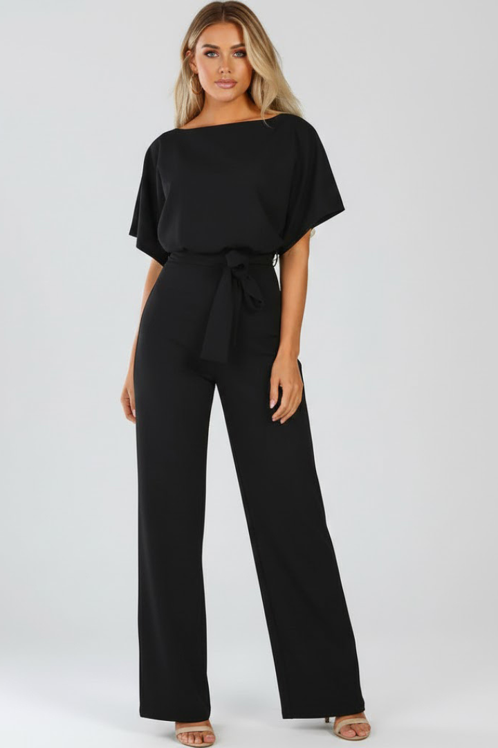 Chic women's wide leg short sleeve jumpsuit with a belted waist, a comfortable and versatile spring outfit.