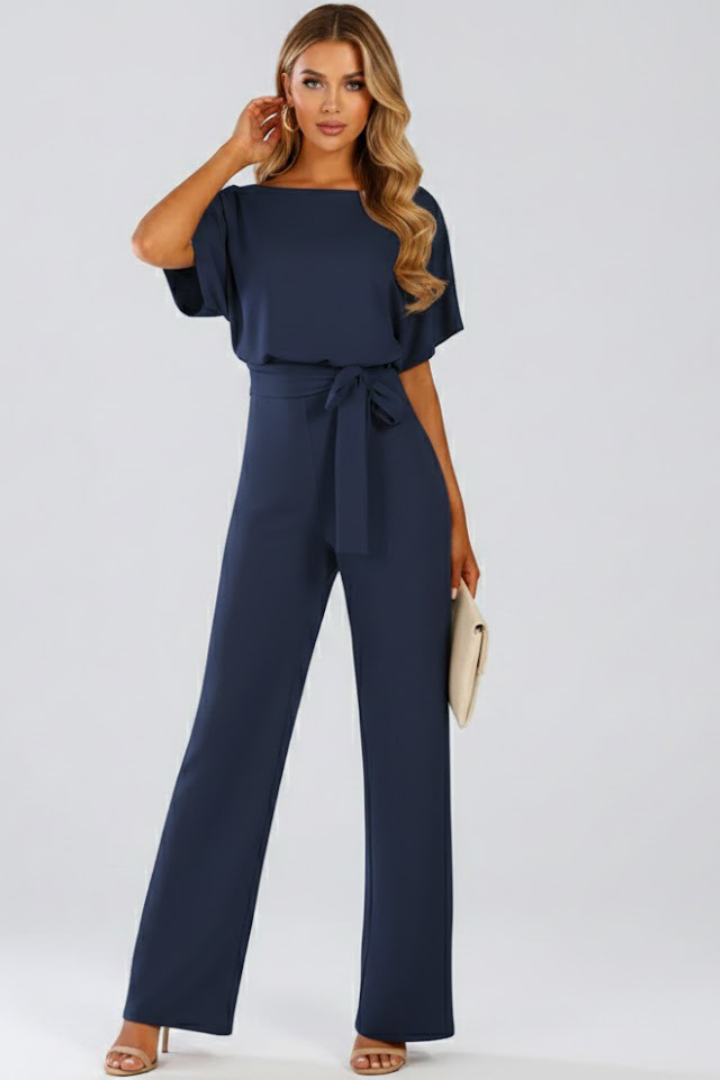 Women's belted wide leg short sleeve jumpsuit, a comfortable and elegant one-piece for versatile styling.