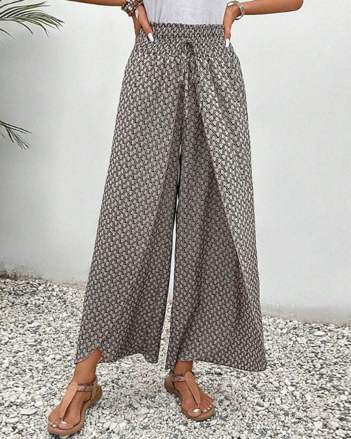 Comfortable women's relaxed fit wide leg trousers featuring a trendy geometric pattern.