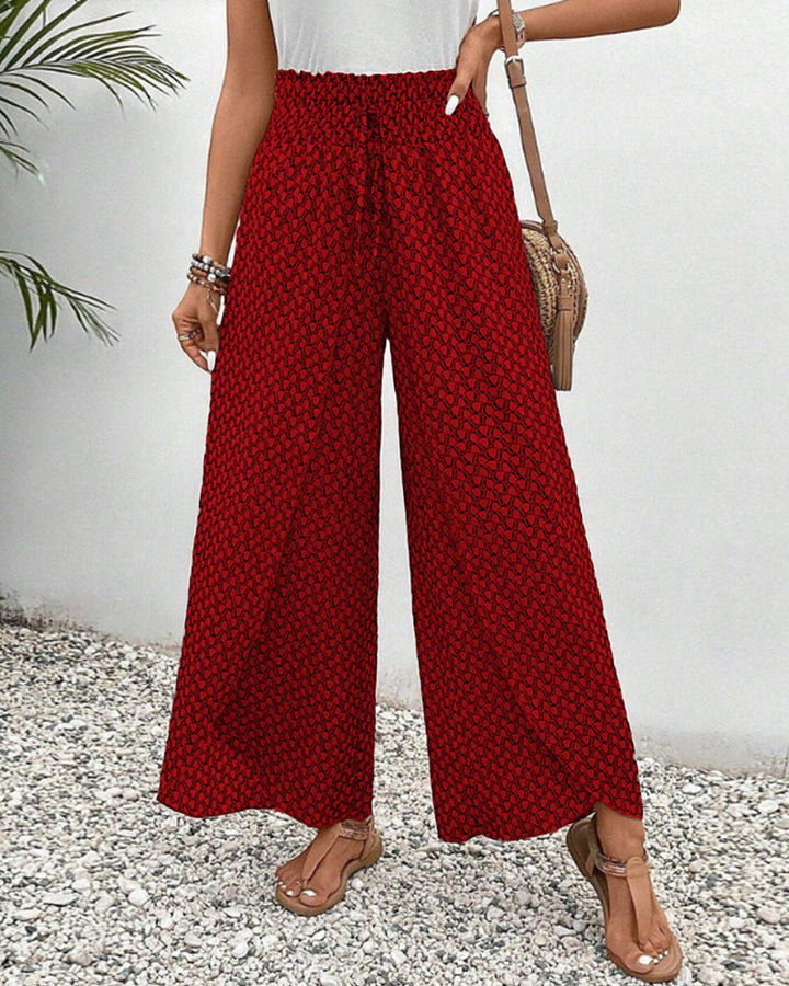 Close-up of the unique geometric print on these comfortable women's wide leg trousers.