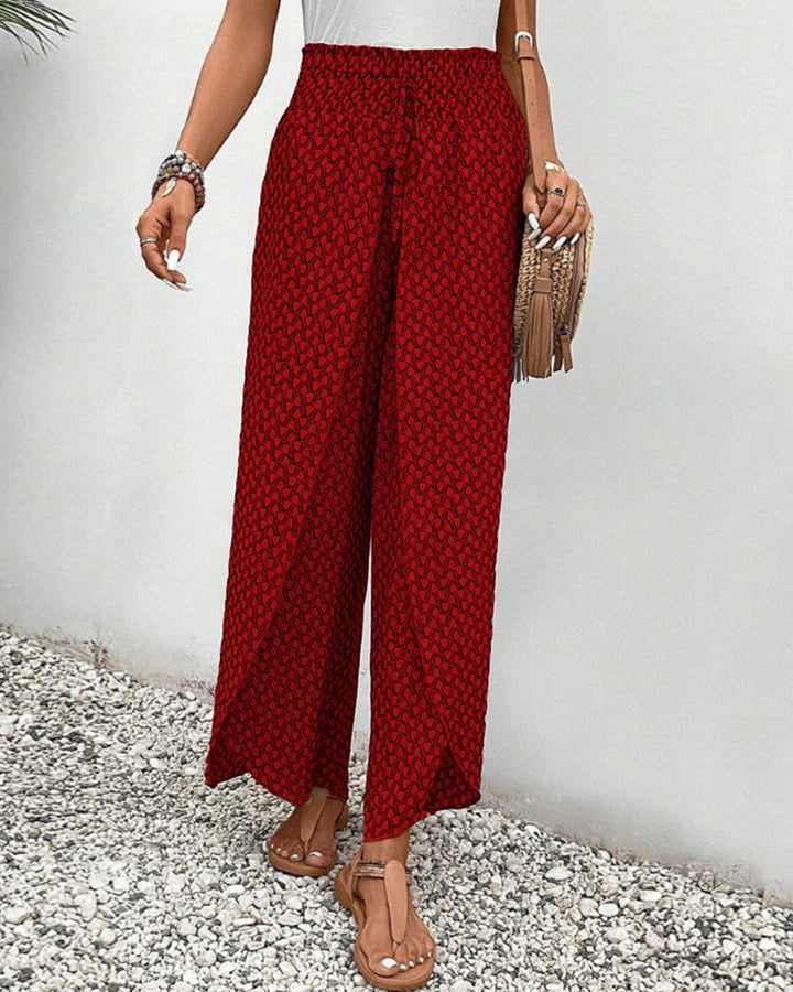 Stylish women's wide leg trousers, geometric print, styled for a chic day-to-night fashion look.