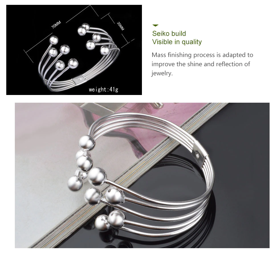 Adjustable wide pearl bracelet for women. Features genuine freshwater pearls & sterling silver craftsmanship.