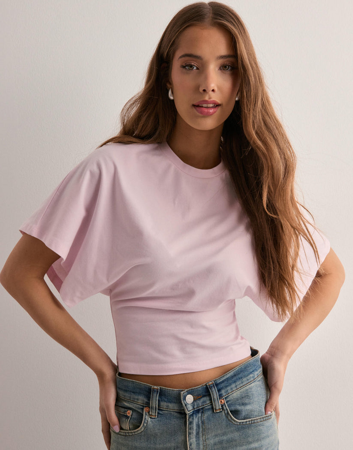 Trendy women's wide sleeve t-shirt. Effortless, chic apparel for modern style & all-day comfort.