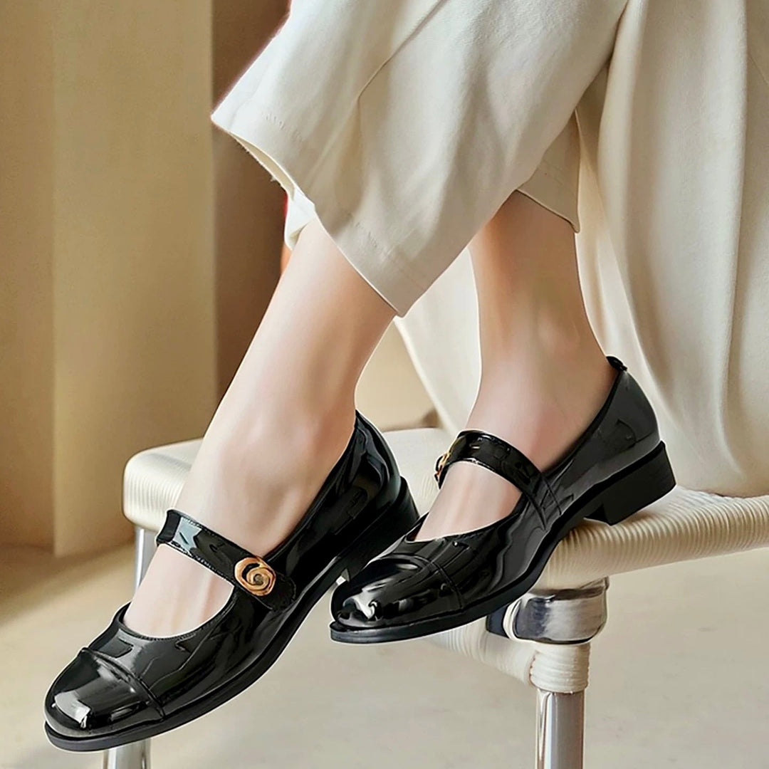 Footwear: Womens Mary Jane flats featuring a wide toe box and superior arch support for ultimate comfort.