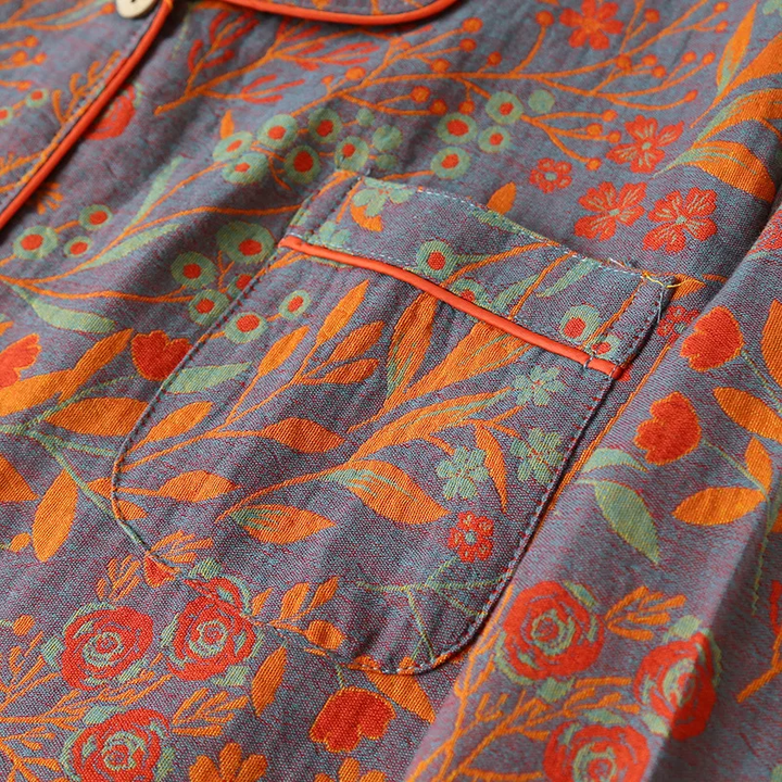 Close-up of elegant wildflower floral pattern on women's comfortable night pajamas set. Botanical print detail.